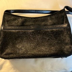 Ann Taylor black leather (cow hide) purse. Very cute, dress up or casual fun.